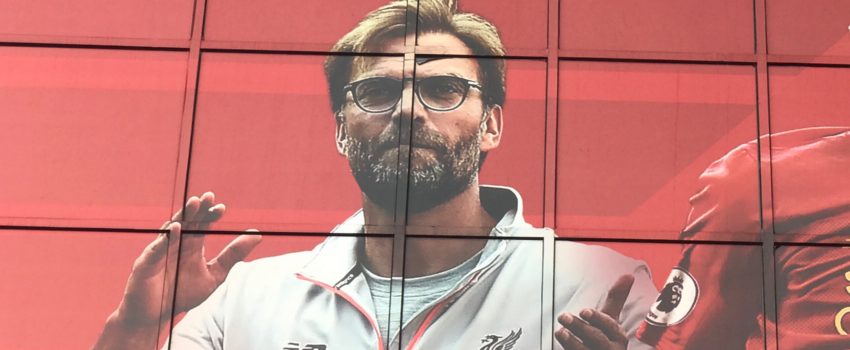 picture of jürgen klopp on the side of the kop
