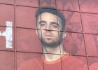 diogo jota's picture on the side of the kop with a red background