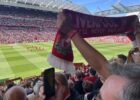 Scarf aloft during You'll Never Walk Alone