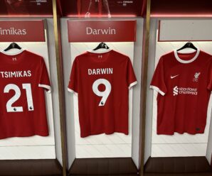the shirts of tsimikas and nunez in the anfield changing room