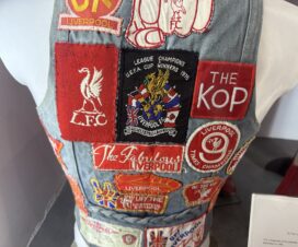 denim jacket covered in old lfc badges