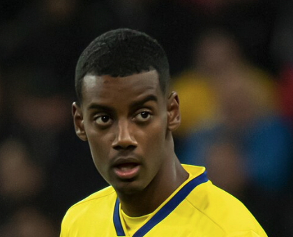 alexander isak in the yellow top of sweden